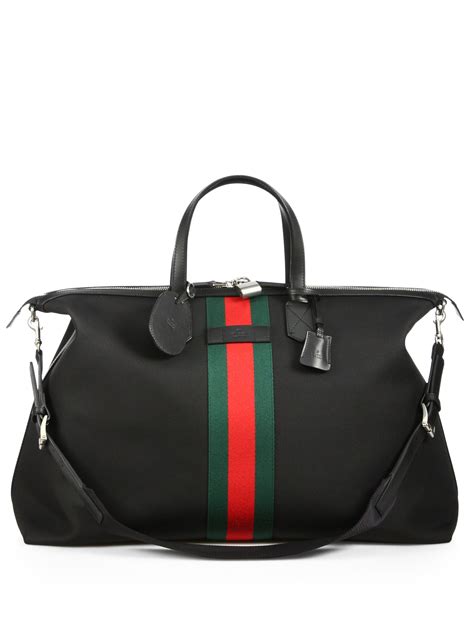 gucci duffle bag black|More.